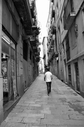 Man Walking in Barric Gotic Barcelona Gothic Quarters.jpg