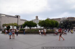 Spanish Locals Walk and Bike in front of Fountain @ Catalunya Square.jpg