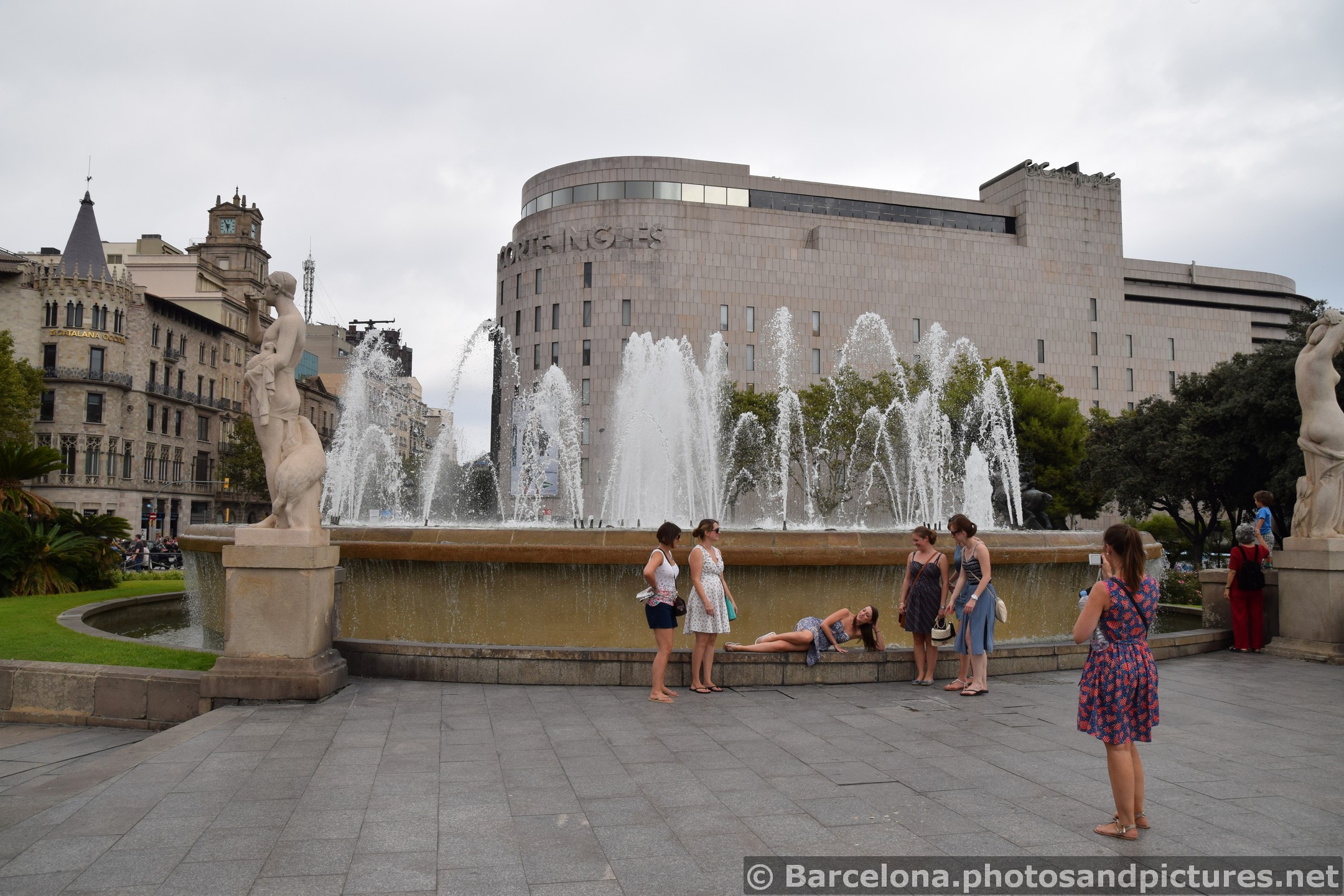 Catalunya Square Fountain Woman Tourist Posing Laying Down.jpg
